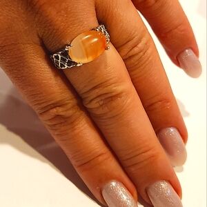 Ring Unisex Opal Orange color stone, Zirconium .Stainless steel Hypoallergenic.